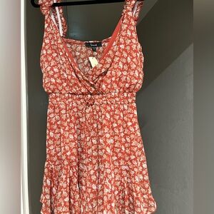 NWT Terracotta floral romper from Francesca’s